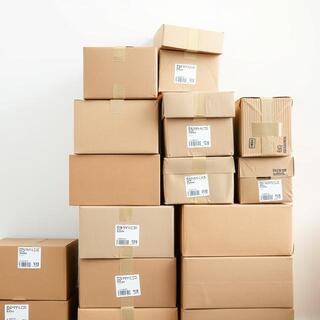 Recycled cardboard packaging and paper tape