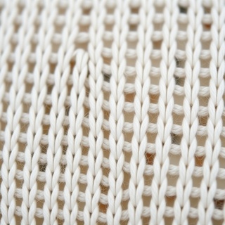 Close-up of airy knit cover texture
