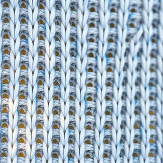 Knit weave close-up showing breathable pores